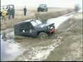 UAZ in deep water-canal.